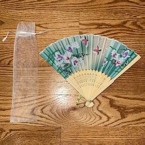Ornate wood handheld fan with butterfly & flower design